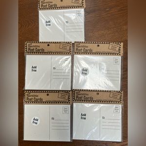 5 sealed packs of acid free printable post cards, each pack containing 12 cards.